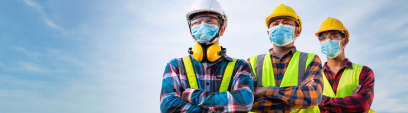 Worker in Personal Protective Equipment | Guide to PPE: What it is, Types of PPE, How to wear PPE