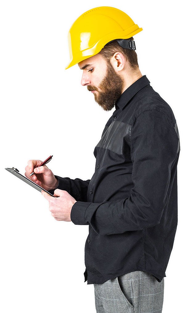 Construction worker with clipboard. 5 common workplace PPE mistakes
